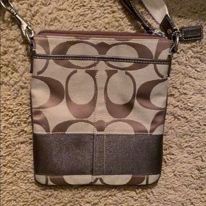 Coach Purse New with 2 openings on both sides